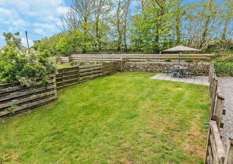 The garden, patio & alfresco dining area at Higher Merrose, Marys Well