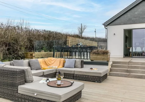 The patio & outdoor living area at Higher Poole, Slapton