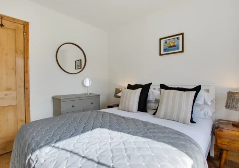 Bedroom #1 at Higher Treliver Farmhouse, St Wenn