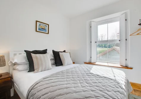 Bedroom #1 at Higher Treliver Farmhouse, St Wenn