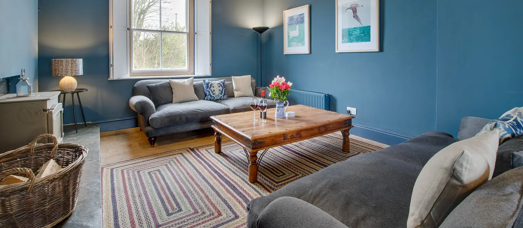 Higher Treliver Farmhouse, St Wenn is a charming four-bedroom Cornish farmhouse with country views and enclosed garden. Featuring a wood-fired hot tub, it's the ideal rural retreat for families seeking authentic countryside charm and lasting memory.