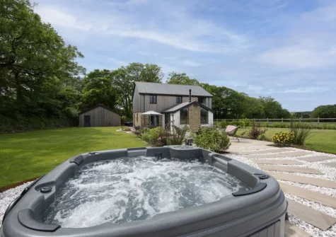 The terrace, hot tub & garden at Highfield Barton, Camborne