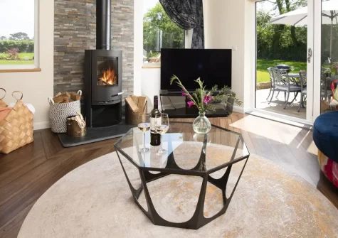 Highfield Barton, Camborne is a sublime four-bedroom countryside retreat set within private acre grounds featuring hot tub, games room, and multiple outdoor terraces. Perfect for families seeking luxury whilst exploring Cornwall's stunning beaches.