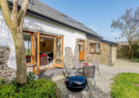 The patio & outdoor sitting area at Highford Barn, Higher Clovelly