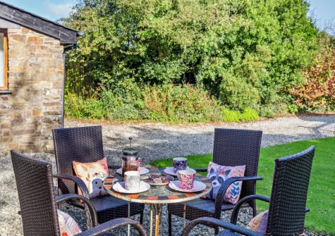 The patio & outdoor sitting area at Highford Barn, Higher Clovelly
