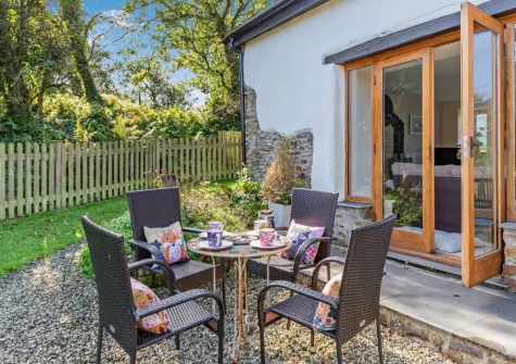 The patio & outdoor sitting area at Highford Barn, Higher Clovelly