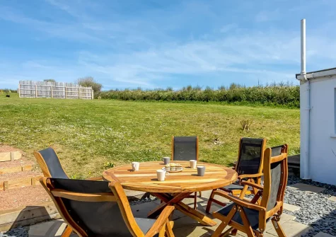 The patio, alfresco dining area & garden at Highlands, Woolacombe