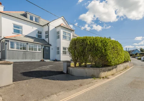 Hillside is a spacious & contemporary home, with stunning sea views from the top floor