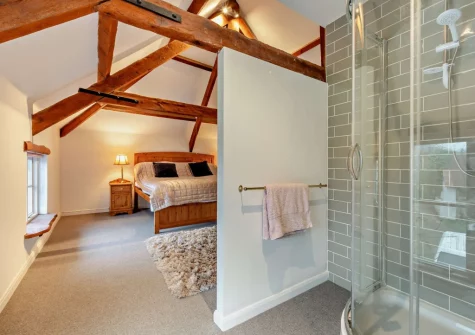 Bedroom #1 & en-suite shower room at Hittisleigh Cottage, Hittisleigh