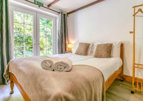 Bedroom #1 at Hollow Tree Cottage, Cambrose