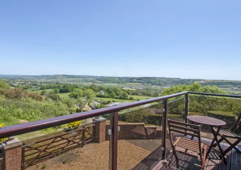The far reaching views fom the balcony & outdoor sitting area at Holly Cottage, Seaton