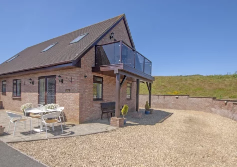 The patio & alfresco dining area at Holly Cottage, Seaton