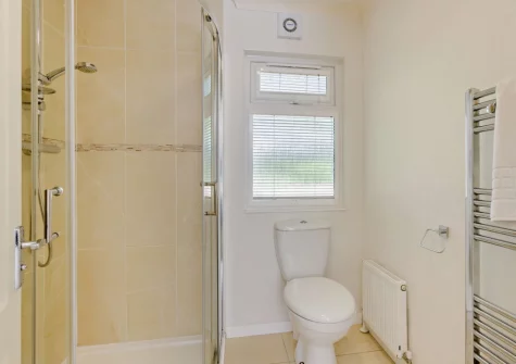 Bedroom #1 en-suite shower room at Holly Lodge, Meldon
