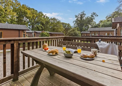 The decked terrace & alfresco dining area at Holly Lodge, Meldon