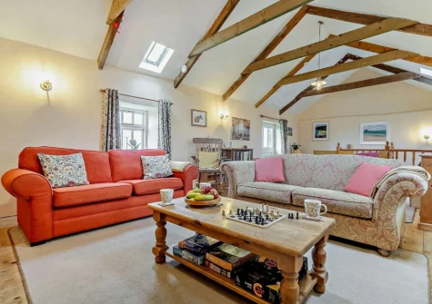 The living room at Hollyberry Barn at Banns Farm, St Buryan