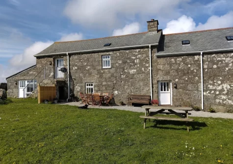 The alfresco dining area & enclosed garden at Hollyberry Barn at Banns Farm, St Buryan