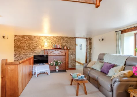 The living room at Honeysuckle Cottage, Frithelstock