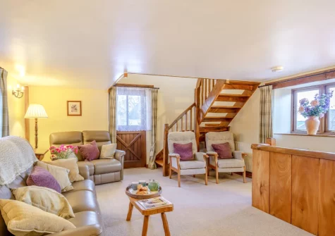 The living room at Honeysuckle Cottage, Frithelstock