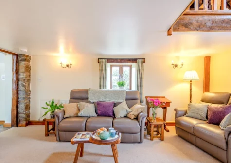 The living room at Honeysuckle Cottage, Frithelstock
