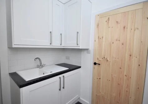 The utility room at Honeysuckle Cottage, Weare Giffard
