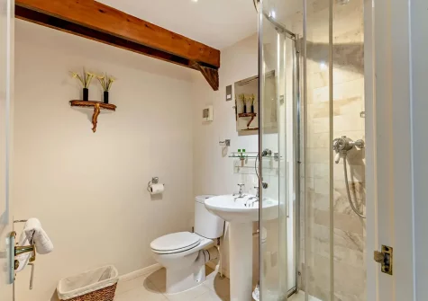 Bedroom #1 en-suite shower room at Hopetown Cottage, Trescott