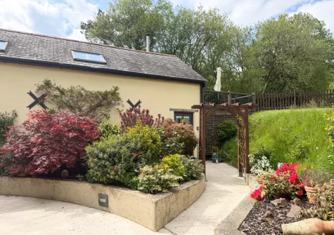 On arrival at Horseford Snug, follow the path around to the beautiful, characterful accommodation which boasts a 'quirky' layout