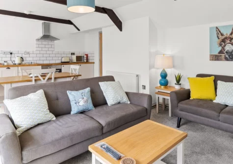 Horseshoe Cottage, Arrowan Common Farm, Ponsongath is a 2-bedroom stone cottage set in Cornwall's Lizard Peninsula. With a well-equipped kitchen, inviting open plan living area, and private courtyard garden, it's ideal for a relaxing family holiday.