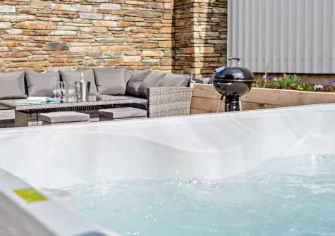 The hot tub & outdoor sitting area at Horslett Stable, Tetcott