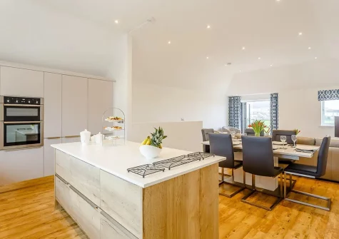 The kitchen & dining area at Howzat Pavilion View, Westward Ho!