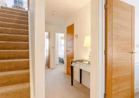 The hallway & stairs up to the living area at Howzat Pavilion View, Westward Ho!