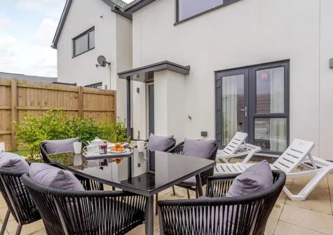 The patio & alfresco dining area at Howzat Pavilion View, Westward Ho!