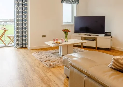 Howzat Pavilion View, Westward Ho! is a stylish three-bedroom detached home with stunning cricket ground views and sea glimpses. Enjoy contemporary amenities, enclosed private garden, and effortless beach access for unforgettable family holidays.