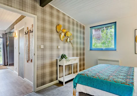 Bedroom #1 at at Hunters Moon, Hartland Forest Lodges, Woolfardisworthy