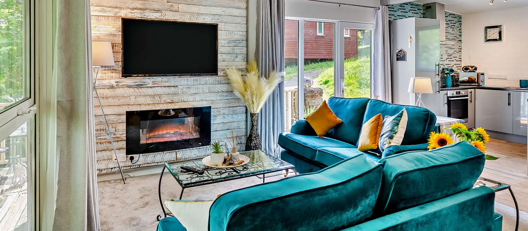Hunters Moon, Hartland Forest Lodges, Woolfardisworthy is a stylish two-bedroom lodge offering contemporary comfort in a peaceful woodland setting. Perfect for families with older children, with a gated balcony & easy access to Devon's attractions.