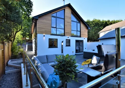 The patio, barbecue, outdoor sitting area & hot tub at Hyford Wood, Bideford