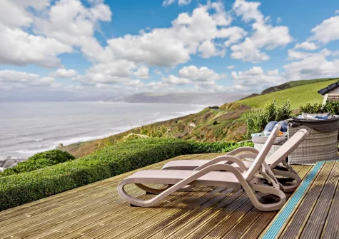 The decked terrace, with sun loungers, at Infinity, Freathy