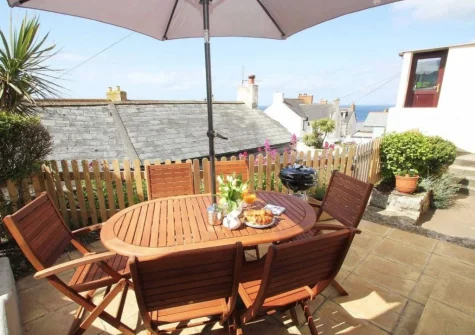 The terrace, barbecue & alfresco dining area at Inglenook, Porthleven