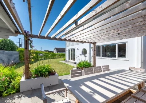 The patio & alfresco dining area at Innisfree, Constantine Bay