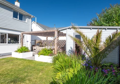The patio, alfresco dining area & enclosed garden at Innisfree, Constantine Bay