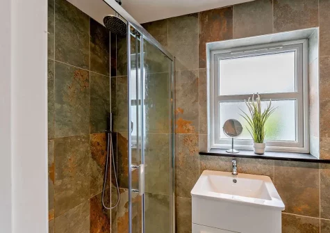 Bedroom #1 en-suite shower room at Into The Blue, Combe Martin