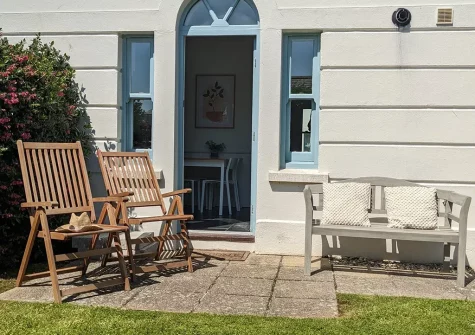 The patio, outdoor sitting area & garden at Islas Surfhouse, Newquay
