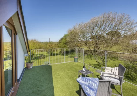 The first floor terrace & outdoor sitting area at Ivy Chimney Cottage, Wheal Rose