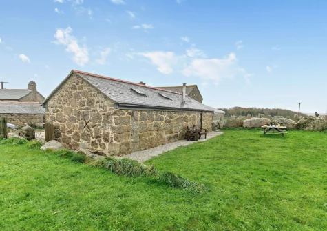 The enclosed garden, alfresco dining & sitting area at Ivy Cottage at Banns Farm, St Buryan