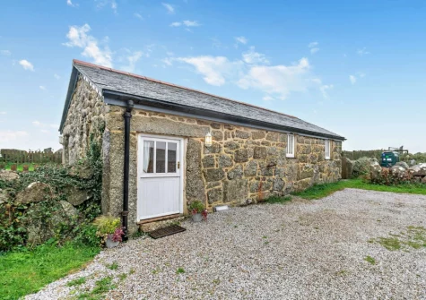 Ivy Cottage at Banns Farm is a Grade II-listed stone cottage with some stunning original features