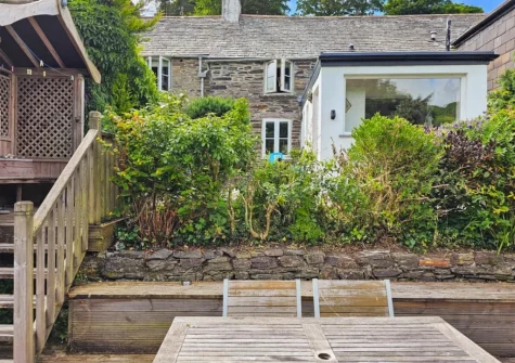 The garden, decked terrace & alfresco dining area at Ivy Cottage, Boscastle