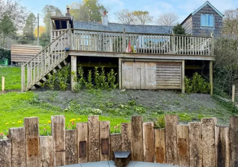 The enlosed garden with fire pit at Ivy Cottage, Boscastle