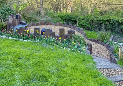 The enlosed garden with fire pit at Ivy Cottage, Boscastle