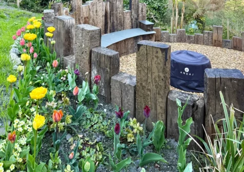 The enlosed garden with fire pit at Ivy Cottage, Boscastle