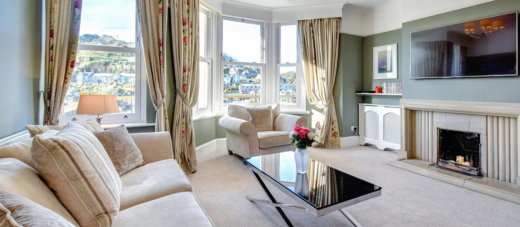 Ivydene, Looe is a spacious Victorian family home with stunning harbour views, original character features, and modern comforts. Enjoy al fresco dining on your private terrace and explore Cornwall's coastal treasures from this charming base.