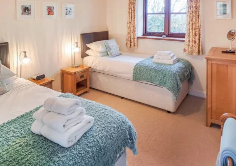 Bedroom #2, made up as two singles, at Jacks Barn, Welcombe